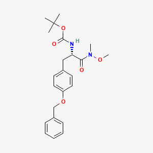 molecular formula C23H30N2O5 B13744089 tert-butyl N-[(2S)-1-[methoxy(methyl)amino]-1-oxo-3-(4-phenylmethoxyphenyl)propan-2-yl]carbamate 