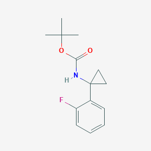 molecular formula C14H18FNO2 B1374624 tert-Butyl N-[1-(2-fluorophenyl)cyclopropyl]carbamate CAS No. 1338218-86-2