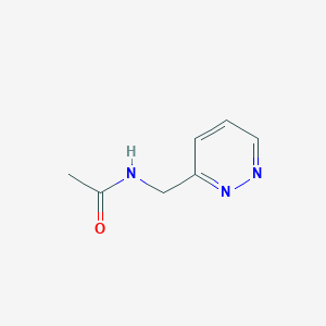 B1374734 N-(pyridazin-3-ylmethyl)acetamide CAS No. 1699949-28-4