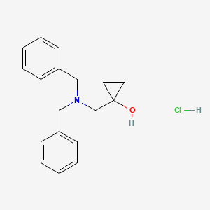 1-[(Dibenzylamino)methyl]cyclopropan-1-ol;hydrochloride