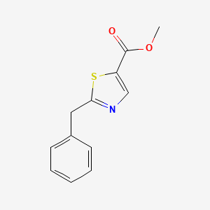 molecular formula C12H11NO2S B1374915 Methyl 2-benzyl-1,3-thiazole-5-carboxylate CAS No. 1208081-28-0