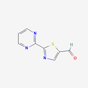 molecular formula C8H5N3OS B1375071 2-(嘧啶-2-基)-1,3-噻唑-5-甲醛 CAS No. 1235474-02-8