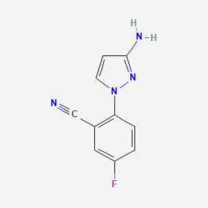 molecular formula C10H7FN4 B1375146 2-(3-amino-1H-pyrazol-1-yl)-5-fluorobenzonitrile CAS No. 1343363-47-2