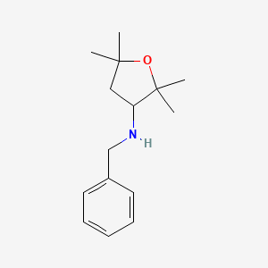 molecular formula C15H23NO B1375723 N-苄基-2,2,5,5-四甲基氧杂环-3-胺 CAS No. 1432679-03-2
