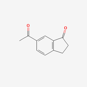 molecular formula C11H10O2 B1375814 6-Acetyl-2,3-dihydro-1H-inden-1-one CAS No. 103987-99-1