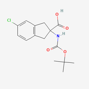 molecular formula C15H18ClNO4 B1375821 2-(Boc-氨基)-5-氯-2,3-二氢-1H-茚烯-2-羧酸 CAS No. 1427501-69-6