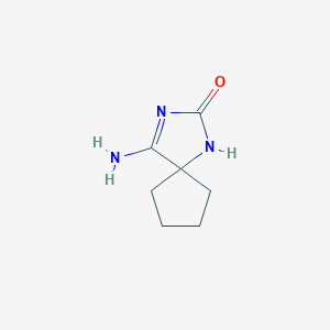 molecular formula C7H11N3O B1376088 4-Amino-1,3-diazaspiro[4.4]non-3-en-2-one CAS No. 79662-82-1
