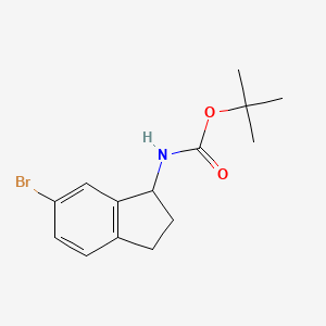 molecular formula C14H18BrNO2 B1376244 tert-Butyl (6-bromo-2,3-dihydro-1H-inden-1-yl)carbamate CAS No. 1414958-70-5