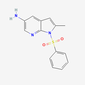 molecular formula C14H13N3O2S B1376328 1-(苯磺酰基)-2-甲基-1H-吡咯并[2,3-b]吡啶-5-胺 CAS No. 1186502-59-9