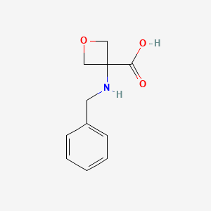 molecular formula C11H13NO3 B1376422 3-(苄氨基)氧杂环-3-羧酸 CAS No. 1159738-31-4