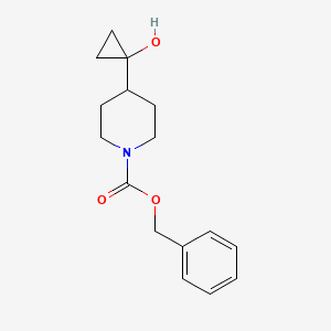 molecular formula C16H21NO3 B1376431 苄基 4-(1-羟基环丙基)哌啶-1-羧酸盐 CAS No. 1358782-66-7