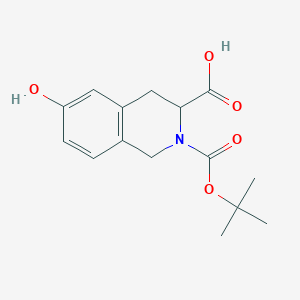 molecular formula C15H19NO5 B1376659 2-[(Tert-butyloxycarbonyl)]-6-hydroxy-1,2,3,4-tetrahydroisoquinoline-3-carboxylic acid CAS No. 845552-56-9