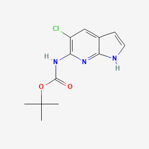 molecular formula C12H14ClN3O2 B1376894 叔丁基（5-氯-1H-吡咯并[2,3-B]吡啶-6-基）氨基甲酸酯 CAS No. 1305325-11-4