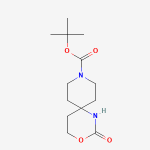 molecular formula C13H22N2O4 B1376931 Tert-butyl 2-oxo-3-oxa-1,9-diazaspiro[5.5]undecane-9-carboxylate CAS No. 1363383-43-0