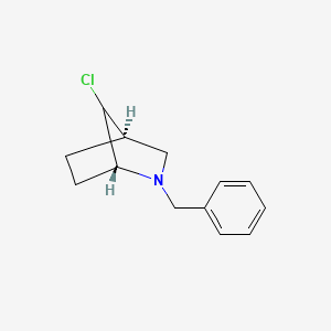 molecular formula C13H16ClN B13770414 (1R,4R)-2-benzyl-7-chloro-2-azabicyclo[2.2.1]heptane 