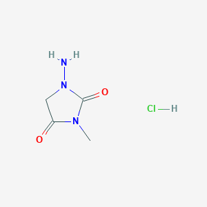 molecular formula C4H8ClN3O2 B1377185 1-Amino-3-methylimidazolidine-2,4-dione hydrochloride CAS No. 64420-18-4