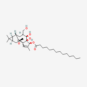 molecular formula C34H56O6 B13774347 Tetradecanoic acid, 1a,2,5,5a,6,9,10,10a-octahydro-5,5a-dihydroxy-4-(hydroxymethyl)-1,1,7,9-tetramethyl-11-oxo-1H-2,8a-methanocyclopenta(a)cyclopropa(e)cyclodecen-6-yl ester, (1aR-(1aalpha,2beta,5beta,5abeta,6beta,8aalpha,9alpha,10aalpha))- CAS No. 83036-62-8