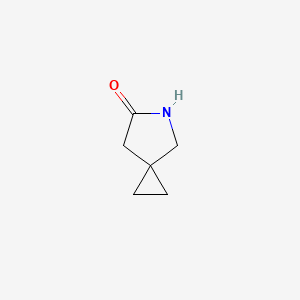 molecular formula C6H9NO B1377553 5-氮杂螺[2.4]庚烷-6-酮 CAS No. 1783637-53-5
