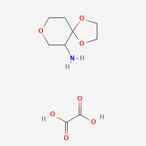 molecular formula C9H15NO7 B1377984 6-氨基-1,4,8-三氧杂螺[4.5]癸烷草酸盐 CAS No. 1392803-05-2