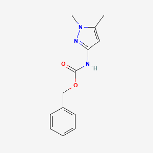 molecular formula C13H15N3O2 B1378216 3-(Cbz-氨基)-1,5-二甲基吡唑 CAS No. 1445322-58-6