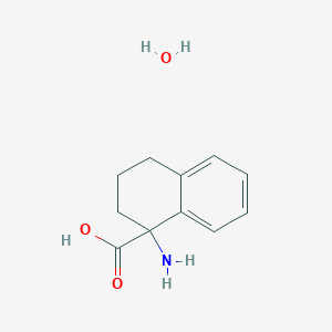 molecular formula C11H15NO3 B1378507 1-Amino-1,2,3,4-tetrahydro-1-naphthalenecarboxylic acid hydrate CAS No. 1559064-07-1