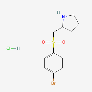 molecular formula C11H15BrClNO2S B1378560 2-([(4-Bromophenyl)sulfonyl]methyl)pyrrolidine hydrochloride CAS No. 1864062-41-8