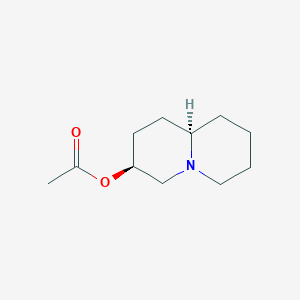 molecular formula C11H19NO2 B13786997 [(3S,9aR)-2,3,4,6,7,8,9,9a-octahydro-1H-quinolizin-3-yl] acetate 