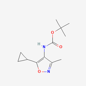 molecular formula C12H18N2O3 B1378717 tert-butyl N-(5-cyclopropyl-3-methyl-1,2-oxazol-4-yl)carbamate CAS No. 1461704-90-4