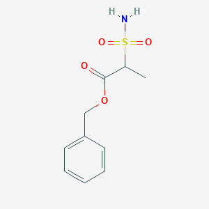 molecular formula C10H13NO4S B1378725 Benzyl 2-sulfamoylpropanoate CAS No. 1461705-34-9