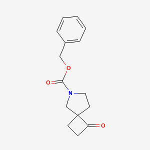 molecular formula C15H17NO3 B1378884 Benzyl 1-oxo-6-azaspiro[3.4]octane-6-carboxylate CAS No. 1419101-13-5
