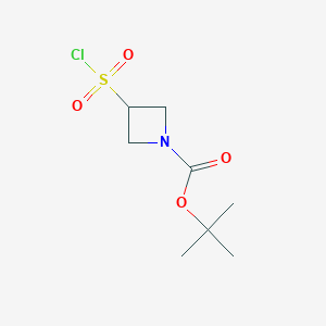 molecular formula C8H14ClNO4S B1378886 Tert-butyl 3-(chlorosulfonyl)azetidine-1-carboxylate CAS No. 1310732-18-3