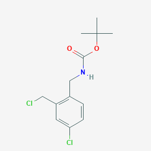 B1378908 Tert-butyl 4-chloro-2-(chloromethyl)benzylcarbamate CAS No. 928754-18-1