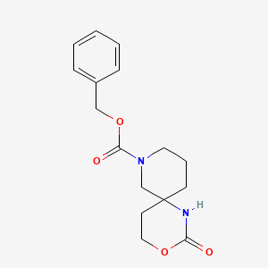 molecular formula C16H20N2O4 B1378921 苯甲基 2-氧代-3-氧杂-1,8-二氮杂螺[5.5]十一烷-8-羧酸酯 CAS No. 1408074-70-3