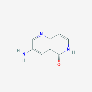 molecular formula C8H7N3O B1379016 3-Amino-1,6-naphthyridin-5-OL CAS No. 1260671-38-2
