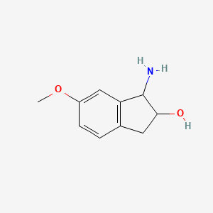 molecular formula C10H13NO2 B13790353 1-Amino-6-methoxy-indan-2-OL CAS No. 831191-90-3