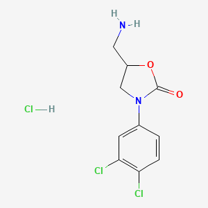 molecular formula C10H11Cl3N2O2 B1379089 5-(Aminomethyl)-3-(3,4-dichlorophenyl)-1,3-oxazolidin-2-one hydrochloride CAS No. 1177273-56-1