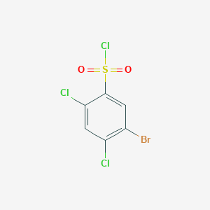 molecular formula C6H2BrCl3O2S B1379158 5-Bromo-2,4-dichlorobenzene-1-sulfonyl chloride CAS No. 1043919-81-8