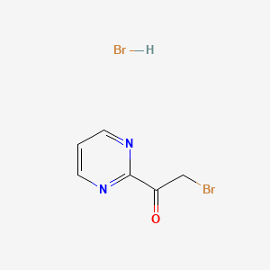 molecular formula C6H6Br2N2O B1379270 2-Bromo-1-(pyrimidin-2-yl)ethanone hydrobromide CAS No. 1588441-02-4