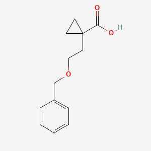 molecular formula C13H16O3 B1379345 1-[2-(Benzyloxy)ethyl]cyclopropane-1-carboxylic acid CAS No. 1803599-29-2