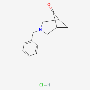molecular formula C13H16ClNO B1379452 3-Benzyl-3-azabicyclo[3.1.1]heptan-6-one hydrochloride CAS No. 1803581-83-0