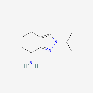molecular formula C10H17N3 B1379530 2-(propan-2-yl)-4,5,6,7-tetrahydro-2H-indazol-7-amine CAS No. 1461714-98-6