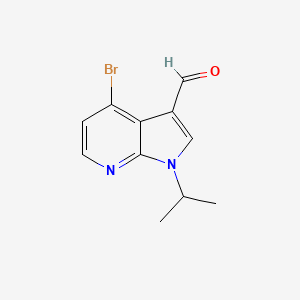 molecular formula C11H11BrN2O B1379901 4-bromo-1-isopropyl-1H-pyrrolo[2,3-b]pyridine-3-carbaldehyde CAS No. 1350760-46-1