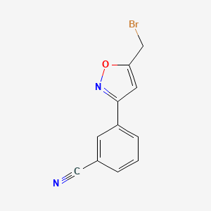 molecular formula C11H7BrN2O B1379925 3-[5-(bromomethyl)-3-isoxazolyl]Benzonitrile CAS No. 1158735-32-0