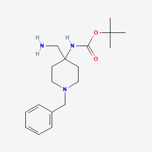 molecular formula C18H29N3O2 B1380090 tert-Butyl N-[4-(aminomethyl)-1-benzylpiperidin-4-yl]carbamate CAS No. 1392491-65-4