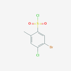 molecular formula C7H5BrCl2O2S B1380594 5-Bromo-4-chloro-2-methylbenzene-1-sulfonyl chloride CAS No. 1416349-30-8