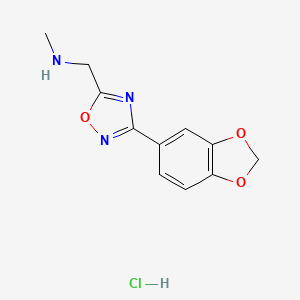 molecular formula C11H12ClN3O3 B1381081 {[3-(1,3-Benzodioxol-5-yl)-1,2,4-oxadiazol-5-yl]methyl}methylamine hydrochloride CAS No. 1638612-66-4