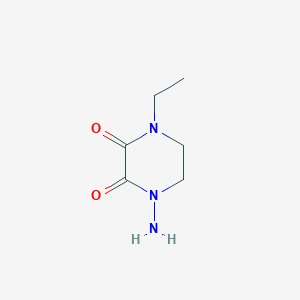 B13810919 1-Amino-4-ethylpiperazine-2,3-dione CAS No. 71999-56-9