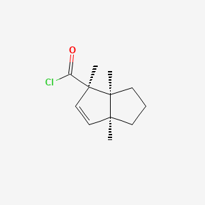 (1R,3aS,6aS)-1,3a,6a-trimethyl-5,6-dihydro-4H-pentalene-1-carbonyl chloride