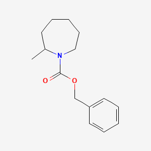 molecular formula C15H21NO2 B1381548 苯甲酸苄酯 2-甲基氮杂环戊烷-1-甲酯 CAS No. 1857523-19-3