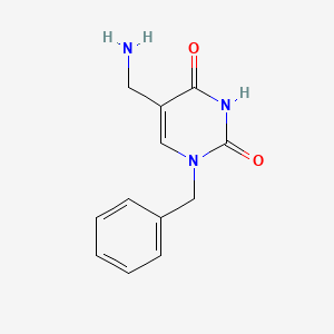 molecular formula C12H13N3O2 B1381688 5-(aminomethyl)-1-benzylpyrimidine-2,4(1H,3H)-dione CAS No. 1889511-70-9